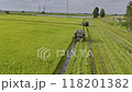 07,09,2024 Lopburi, Thailand, Thai farmers harvest their crops using a modified tractor equipped with rice harvesting machinery in a rice field in Thailand. 118201382