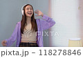 Asian women and beautiful bloggers wear headphones dancing videos by smartphone cameras. Creator vlogger talent dancing enjoys hobby content recording show video sharing on social media. 118278846