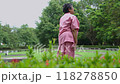 Retirement elderly old patient asian women use cane and walking in hospital outdoor park After rehabilitation and the illness has healed. healthy strong medical concept. 118278850