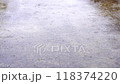 Rain footprints on the concrete road 118374220
