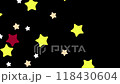 回転する黄色い星が飛ぶ背景・黒バック 118430604