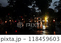 Crowded of people wear raincoats traffic on vehicle as motorbikes,cars moving on street in rainy  night, tropical depression make rain on Ho chi Minh city, Vietnam at rush hour 118459603