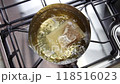 A scene of boiling a dashi pack in a pot 118516023