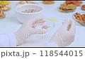 Template footage shows a scientist slowly dropping a yellow solution into a mixture of clove powder and poria cocos wolf, with petri dishes containing herbals and solution bottles in the background. 118544015