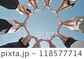 Group of friends forming star shape with hands together 118577714