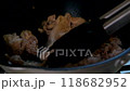 Fry meat in a frying pan. Stir-fry dishes. 118682952