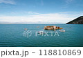 Skadar Lake Montenegro Seaside View Featuring Boats and a Distant Island 118810869