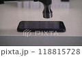I hit the iPhone with a hammer. IPhone and hammer. 118815728