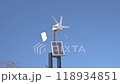 A wind vane whose propeller rotates with the wind 118934851