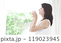 A woman drinking water 119023945