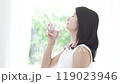 A woman drinking water 119023946