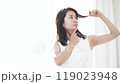 A young woman who is concerned about damaged hair 119023948