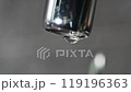 extreme close up dripping water from faucet leaking tap. waste water. drops of water dripping from mixer tap. leaky valve. save water concept budget 119196363