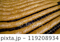 Meat sausage. The production process of thin sausages. Sausage production. 119208934