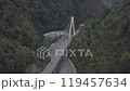 Aerial around epic modern cable-stayed bridge Adler road Krasnaya polyana Sochi Russia suburban freeway cars traffic among high mountains. Natural landscape green slopes. Travel landmark. High quality 119457634