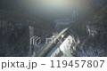 Aerial of a highway in the mountains. An automobile cable-stayed bridge over a mountain river in a gorge. The concept of civil engineering in a mountainous area. 119457807