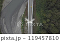 Aerial around epic modern cable-stayed bridge Adler road Krasnaya polyana Sochi Russia suburban freeway cars traffic among high mountains. Natural landscape green slopes. Travel landmark. High quality 119457810