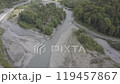Aerial around epic modern cable-stayed bridge Adler road Krasnaya polyana Sochi Russia suburban freeway cars traffic among high mountains. Natural landscape green slopes. Travel landmark. High quality 119457867