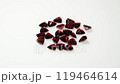 Charming Collection of Red Gemstones on a Clean Surface 119464614