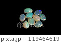 Mesmerizing Composition of Iridescent Opal Gemstones on a Black Background 119464619