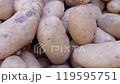 Potatoes at a lively Italian market stall 119595751