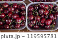 Sweet cherries at a bustling Italian market 119595781