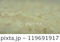 Macro slow motion video of rice grains falling onto rice 2 119691917