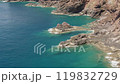 A scenic flight through the volcanic ocean shores. Rocks near Canical on Madeira Island, Portugal 119832729
