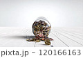 Coins are falling inside the glass jar, Saving money concept, Bank deposit 120166163