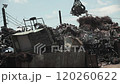 Crane heavy machinery at a garbage disposal site with electric wires 120260622