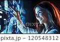 A woman operating a futuristic interface 120548312