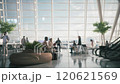 People in the airport waiting room. Airport waiting room with large windows 120621569