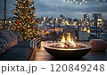 Christmas cozy terrace atmosphere on a rooftop with fire pit and city lights illuminating the night 120849248