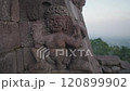 Candi Sukuh - 15th century Javanese Hindu Pyramidal temple in Central Java, Indonesia on the western slope of Mount Lawu with erotic art sculptures ruin 120899902