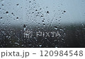 Rain Drops Streaming Down Window 120984548