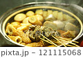 Steam rising from a pot of oden 121115068