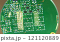 Circuit board controlled under microscope magnifying glass, robotization, automation and industry 4.0 concept, real time 121120889