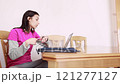 Entrepreneur or student Woman explaining during video call with team members 121277127