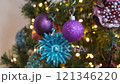 Beautiful and decorated Christmas tree ornaments. Christmas mood. Ambiance Beautiful and decorated Christmas tree ornaments. Christmas mood. Ambiance 121346220