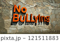Sign that says "No Bullying" is on a stone wall 121511883