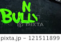 The phrase No Bullying emerges in vibrant green letters against a black wall 121511899