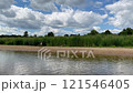 Riverside scene with a stork 121546405