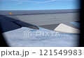 Top bird eye View from passenger porthole of beautiful landscape Flying airplane engine wing of plane fly on sunny cloudy day in winter. Transport, tourism, travel, flight, holidays vacation concept. 121549983