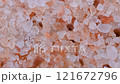 Top down view. Heap of pink Himalayan salt stone, crystals. Slider shot. Food, spice, cooking ingredients, culinary, spa treatment concepts. Macro footage in 4k. 121672796