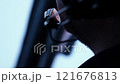 Close-up view of a headset worn by an operator. Pilot wearing a headset is engaged in a conversation 121676813