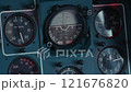 Detailed view of aircraft gauges in an aviation cockpit during a flight operation. Helicopter dashboard 121676820