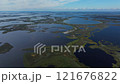 Lakes. Vast wetlands and numerous water bodies stretch across a remote area 121676822