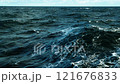 Storm, sea. Wind breaks waves with splashes. White foam on wind. Side view along ship. 121676833