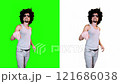 Man flipping through virtual pages in front of screen 121686038