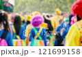Holiday in the Cypriot city of Limassol, thousands of people in multicolored suits dressed with masks. 121699158